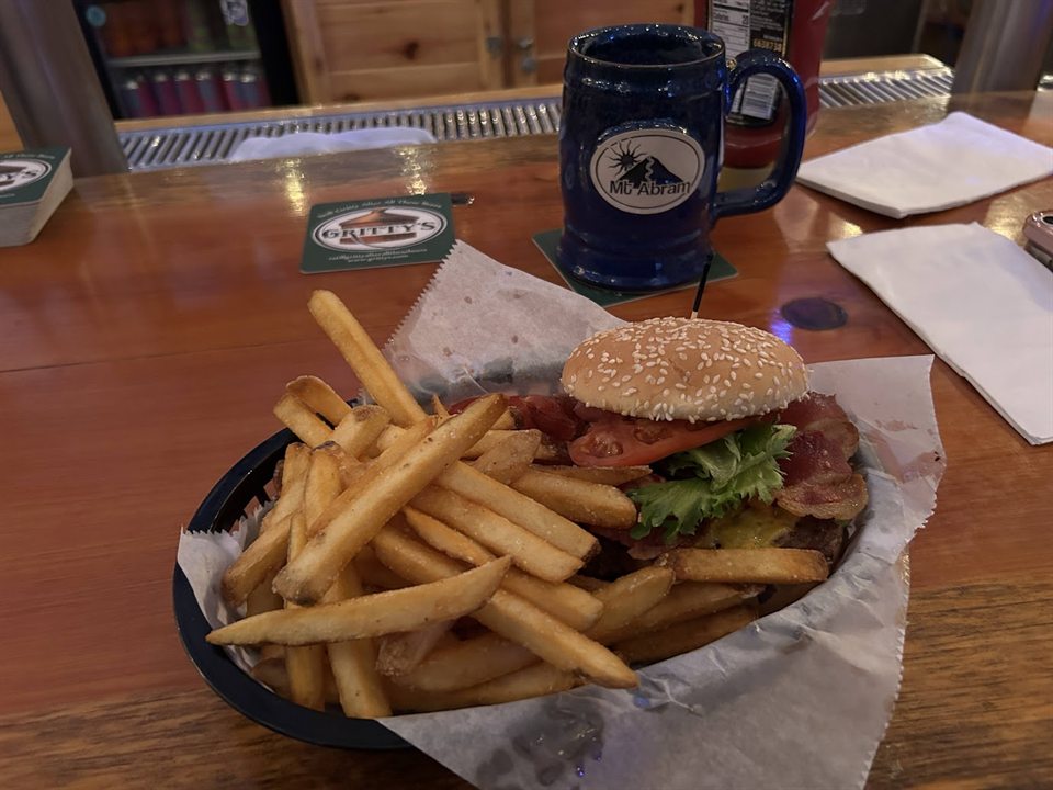 Burger, fries, and a Mt. Abram mug at Loose Boots Lounge