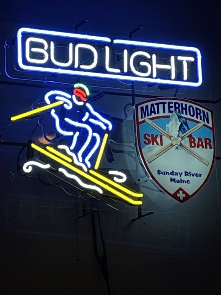 The glowing Matterhorn Ski Bar neon skier and sign