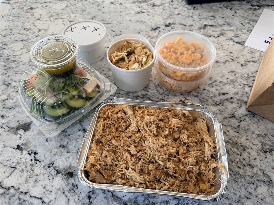 Pulled pork, macaroni salad, slaw, and salad from Smokin’ Good BBQ