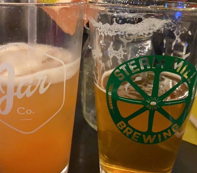 Steam Mill Brewing beer glasses on a table